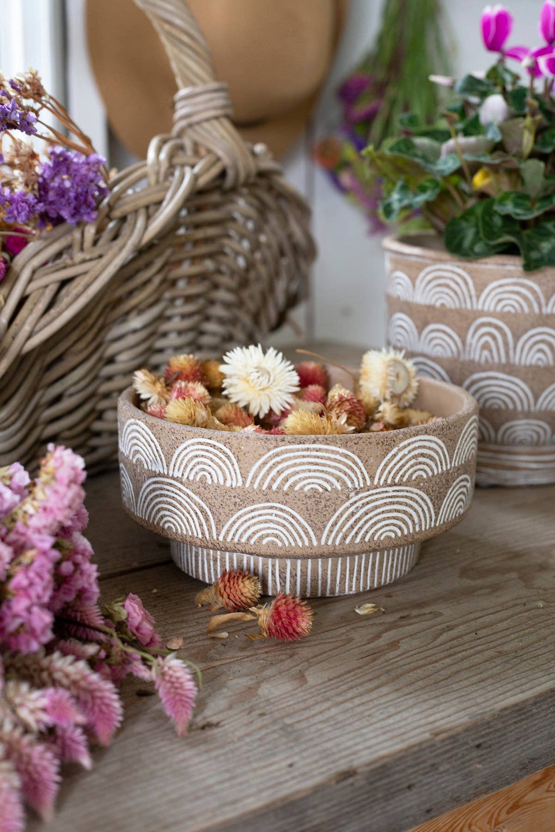 ROUND CEMENT BOWL WITH DESIGN AND FOOTED BASE
